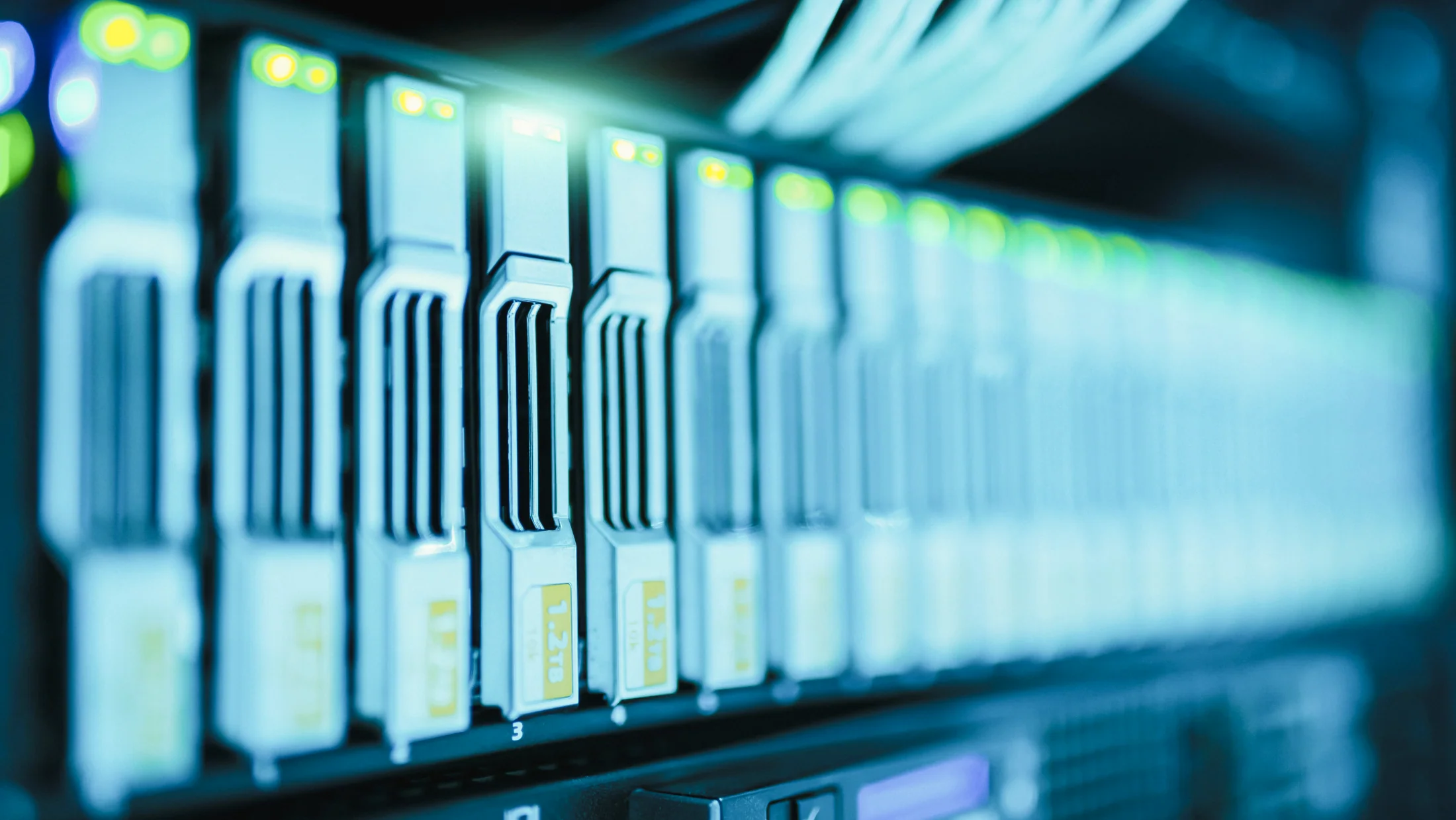 Data center infrastructure showing cooling systems, server arrays, and facility scale